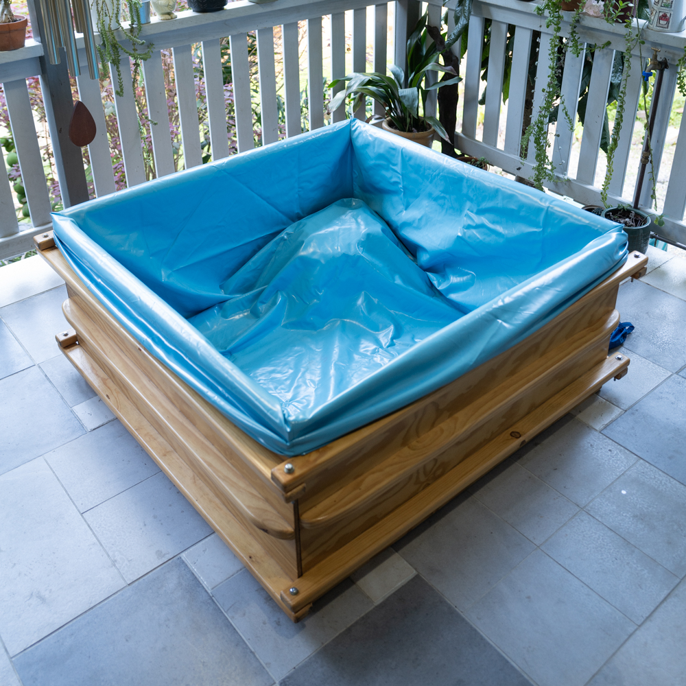 wooden birth pool set up