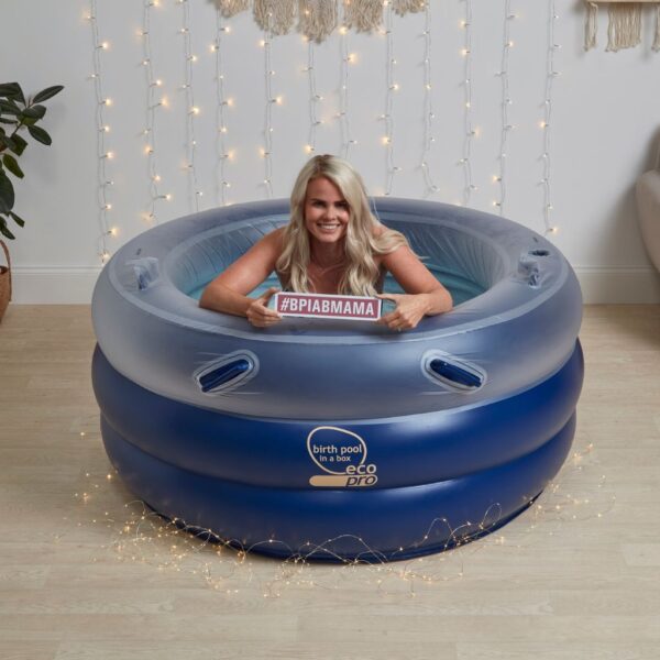 new dark blue birth pool in a box with model